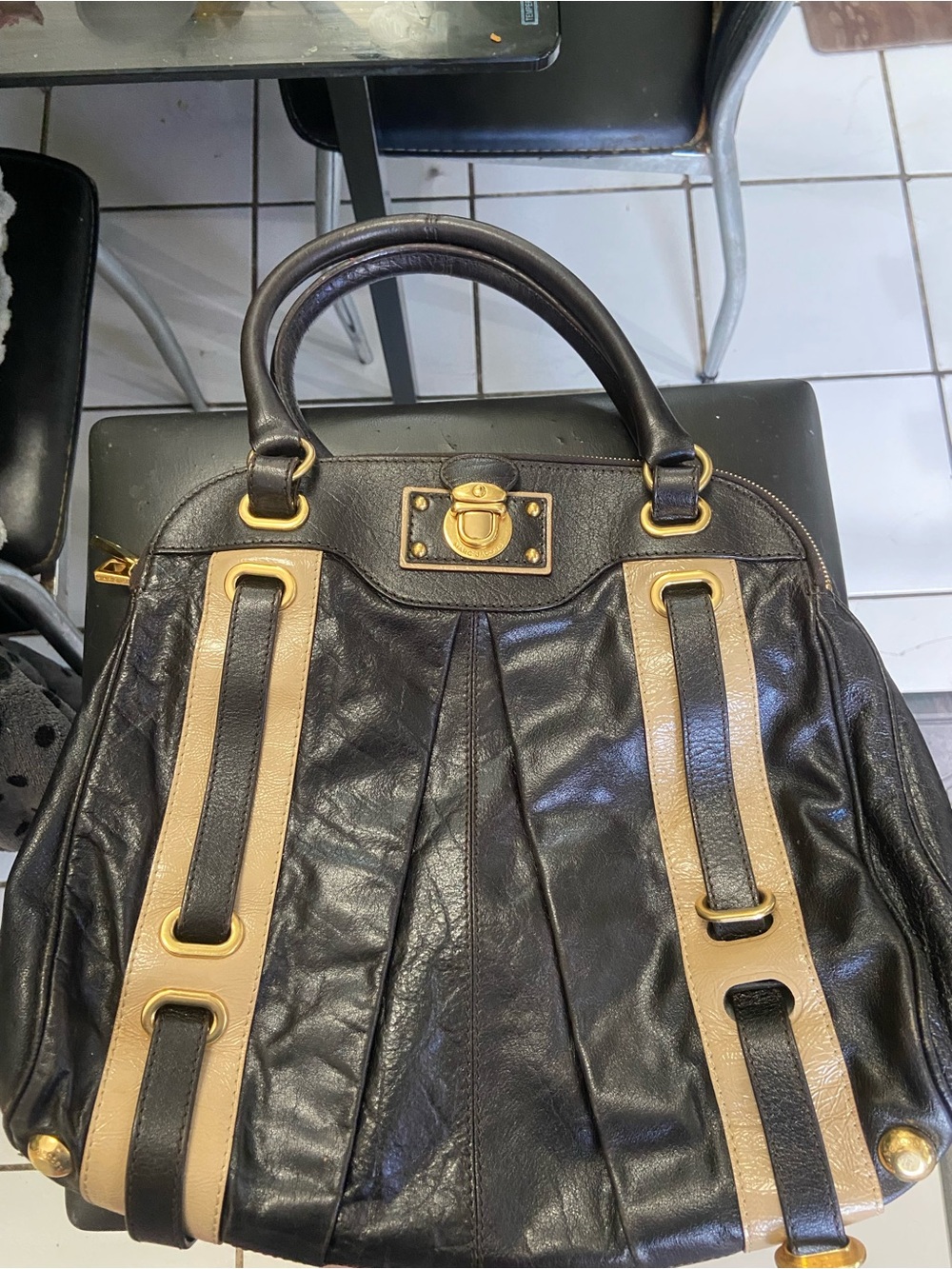 Marc Jacob’s Black and Tan Leather Satchel with Gold Hardware